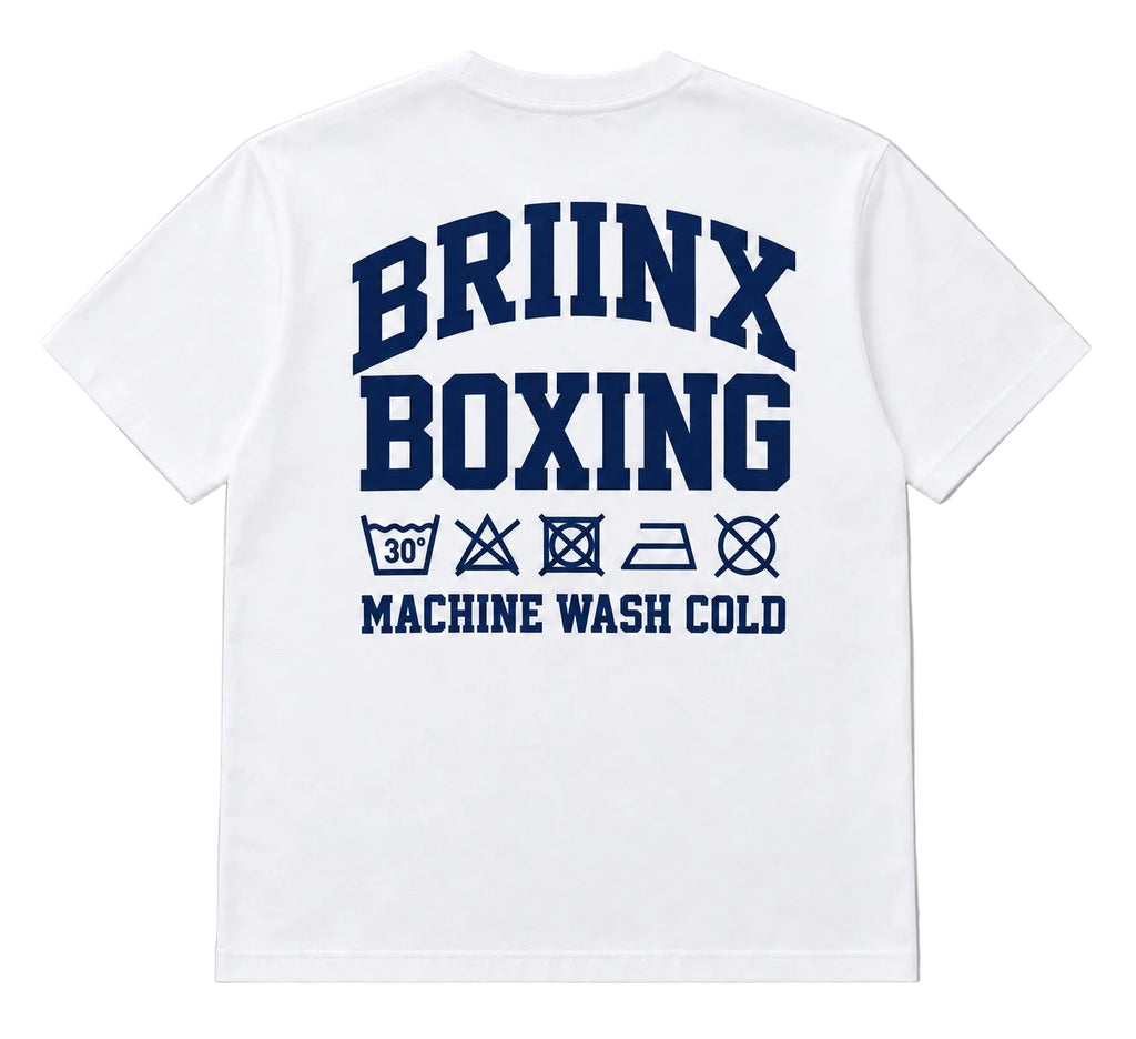 White short-sleeve T-shirt shown from the back on a light gray background, featuring large navy blue text reading 'BRIINX BOXING' with smaller 'MACHINE WASH COLD' and laundry care symbols below.