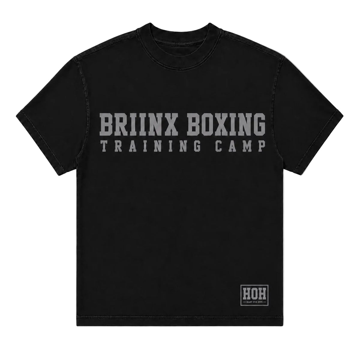 A black short-sleeve t-shirt with 'BRIINX BOXING TRAINING CAMP' printed in distressed gray letters across the chest, and a small 'HOH' logo patch on the bottom right hem, shown against a light gray background.